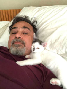 Dad claimed he didn't like cats until he cared for cat