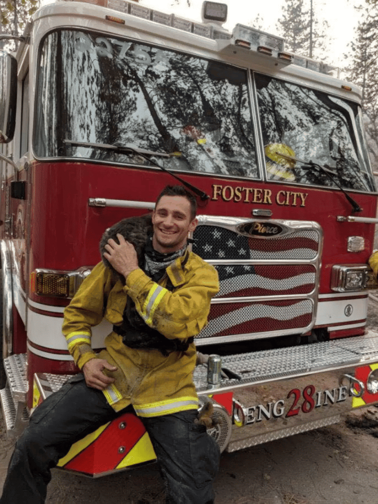 A cat rescued from a wildfire becomes quick friend of the man who saved him 6